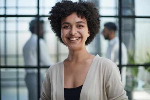 Portrait of a young business woman in an modern office