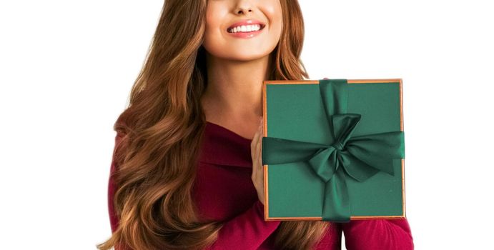 Birthday, Christmas or holiday present, happy woman holding a green gift or luxury beauty box subscription delivery isolated on white background, portrait