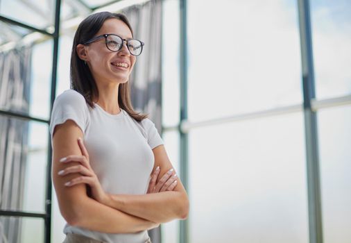 Portrait of a young business woman in an modern office