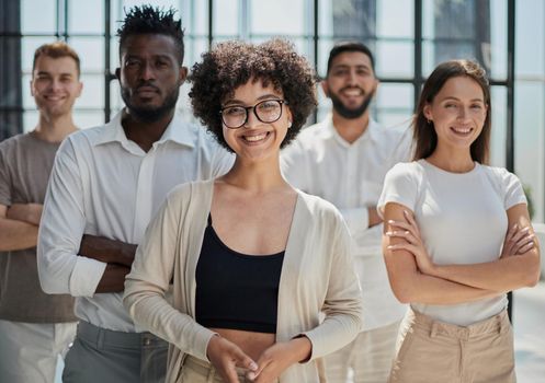 Face of beautiful woman on the background of business people