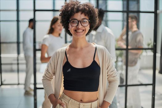 Face of beautiful woman on the background of business people