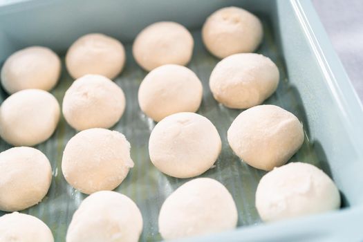 Baking dinner rolls from the premade frozen dough in the baking pan.