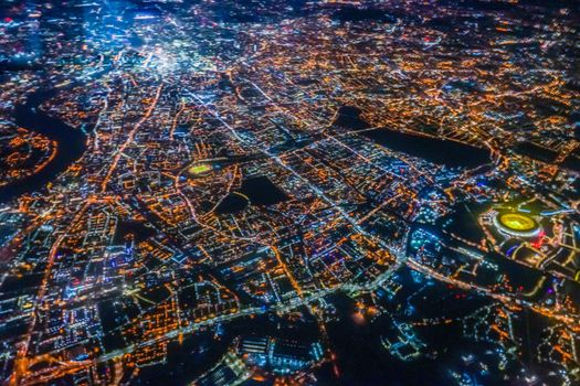 Night view of London seen from the plane. Shooting Location: United Kingdom, London
