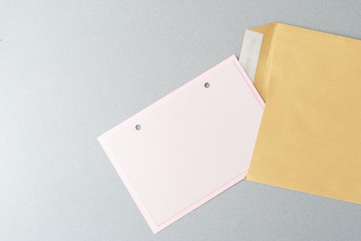 A vintage envelope with a piece of paper.