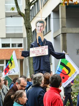 LE MANS, FRANCE - OCTOBER 10, 2017: The figure of the president of France Emmanuel Macron during a strike against new laws