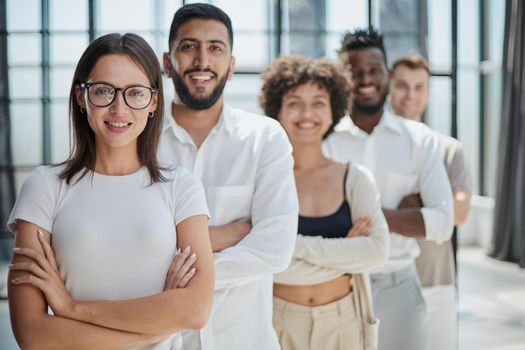 Face of beautiful woman on the background of business people