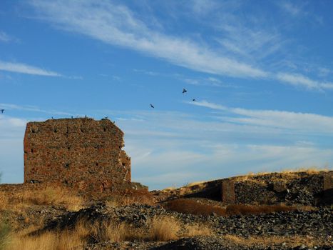 Ruins of an old abandoned mine in the countryside