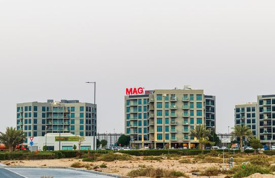 Dubai, UAE - 09.27.2022 - Shot of a modern buildings in MAG 560 district