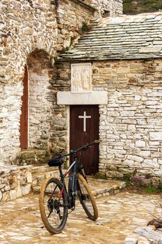 An e-bike at the Orthodox monastery Saints Asomatos in Penteli, a mountain to the north of Athens in Greece.