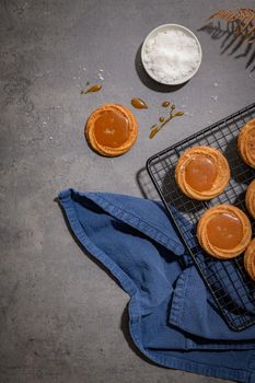 Caramel cookies flowing out of the oven, in the kitchen after baking.