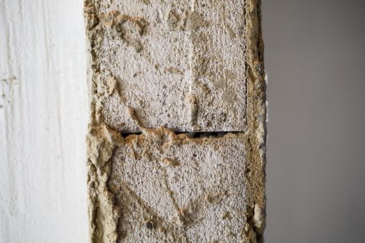 Wall with white blocks, putty on a white wall, concrete wall texture background, cement wall, plaster texture, for designers