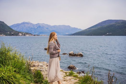 Woman tourist in Herceg Novi old town. Historical and touristic center of Herceg Novi. Montenegro.