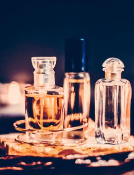 Perfumery, cosmetic branding and spa concept - Perfume bottles and vintage fragrance at night, aroma scent, fragrant cosmetics and eau de toilette as luxury beauty brand, holiday fashion parfum design