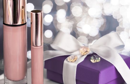 Cosmetic branding, Christmas glitter and girly blog concept - Holiday make-up foundation base, concealer and purple gift box, luxury cosmetics present and blank label products for beauty brand design