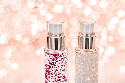 Cosmetic branding, blank label and glamour present concept - Holiday make-up base gel, serum emulsion, lotion bottle and rose gold glitter, luxury skin and body care cosmetics for beauty brand ads