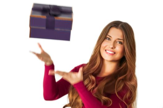 Birthday, Christmas or holiday present, happy woman holding a purple gift or luxury beauty box subscription delivery isolated on white background, portrait