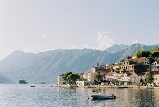 Motorboat is moored off the coast of Perast. Montenegro. High quality photo