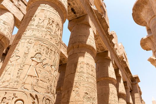 Hieroglyphs written on the columns of the egyptian temple of Karnak