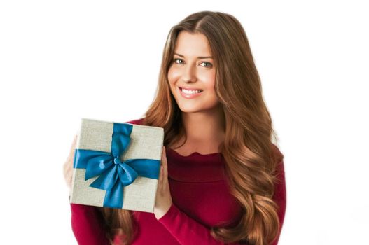 Christmas holiday present, happy woman holding a gift or luxury beauty box subscription delivery isolated on white background, portrait