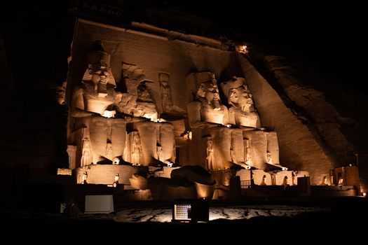 Light illuminated the entrance of Ramses II temple in Egypt during the night