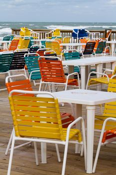 Empty patio with multi color chair.
