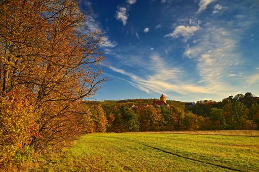 Beautiful Autumn Landscape with Veveri Castle. Natural colorful scenery with sunset. Brno dam-Czech Republic-Europe.