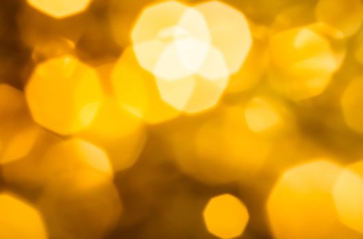 Golden Christmas lights, New Years Eve fireworks and abstract texture concept - Glamorous gold shiny glow and glitter, luxury holiday background