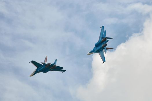 Performance of the aerobatic team Russian Knights, Russian Air Force. On planes Sukhoi Su-30SM, NATO code name: Flanker-C. International Military-Technical Forum Army-2020 . 09.25.2020, Moscow, Russia