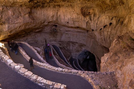 Switchback footpath winds into natural opening of Carlsbad Caverns.