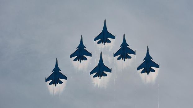 Performance of the aerobatic team Russian Knights, Russian Air Force. On planes Sukhoi Su-30SM, NATO code name: Flanker-C. International Military-Technical Forum Army-2020 . 09.25.2020, Moscow, Russia