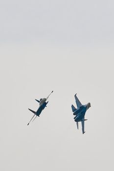 Performance of the aerobatic team Russian Knights, Russian Air Force. On planes Sukhoi Su-30SM, NATO code name: Flanker-C. International Military-Technical Forum Army-2020 . 09.25.2020, Moscow, Russia