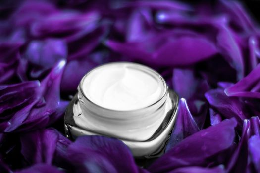 Cosmetic branding, moisturizing and anti-age - Luxury face cream moisturizer for facial skin on purple flower background, floral essense, spa cosmetics and beauty emulsion for skincare brand product