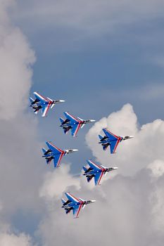 Performance of the aerobatic team Russian Knights, Russian Air Force. On planes Sukhoi Su-30SM, NATO code name: Flanker-C. International Military-Technical Forum Army-2020 . 09.25.2020, Moscow, Russia