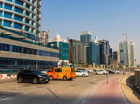 Dubai, UAE - 09.29.2022 - Modern buildings in Business Bay district