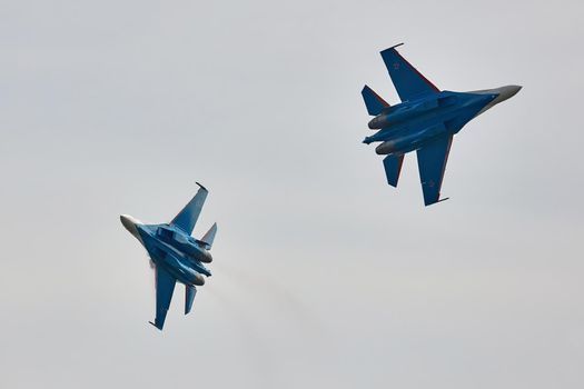 Performance of the aerobatic team Russian Knights, Russian Air Force. On planes Sukhoi Su-30SM, NATO code name: Flanker-C. International Military-Technical Forum Army-2020 . 09.25.2020, Moscow, Russia