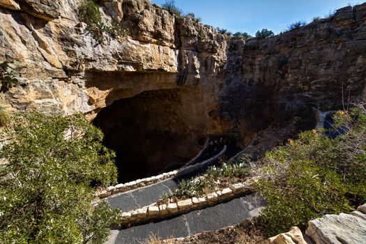 Switchback footpath winds into natural opening of Carlsbad Caverns.