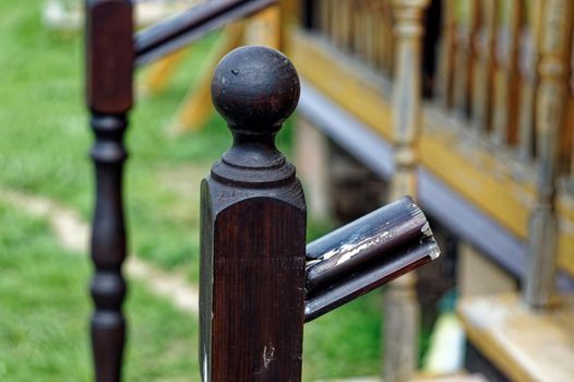 broken wooden railings of a village house, russia