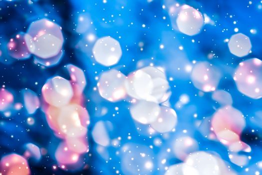 Christmas lights, New Years Eve fireworks and abstract texture concept - Magic sparkling shiny glitter and glowing snow, luxury winter holiday background