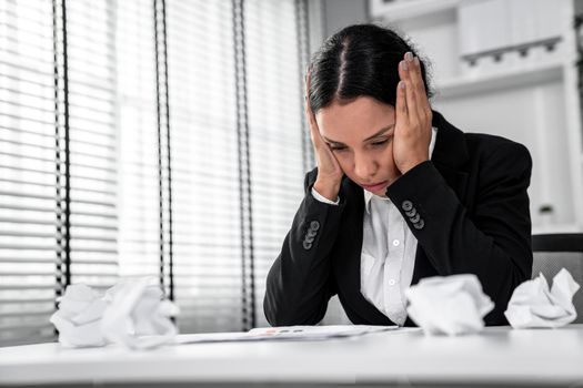 A competent female employee who has become completely exhausted as a result of overburdened work. Concept of unhealthy life as an office worker, office syndrome, effect from overwork.