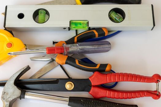 various renovation instruments and tools on white isolated background