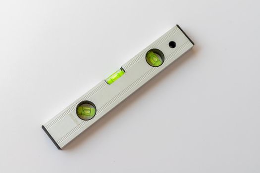 Spirit level tool top view on white isolated background