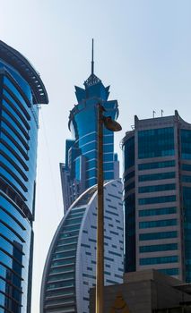 Dubai, UAE - 09.29.2022 - Modern buildings in Business Bay district