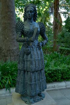 esculpture with typical costume of ronda ,malaga ,spain in the park
