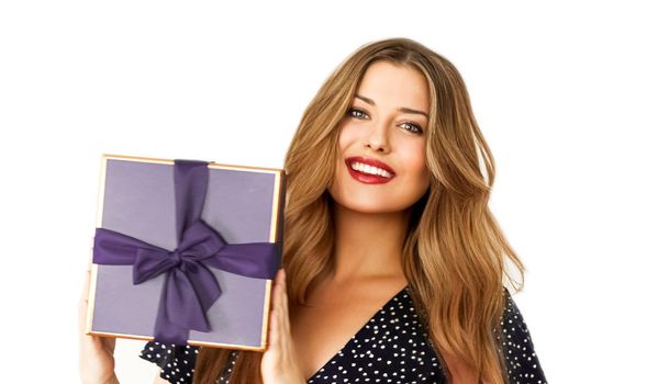 Birthday, Christmas or holiday present, happy woman holding a purple gift or luxury beauty box subscription delivery isolated on white background, portrait