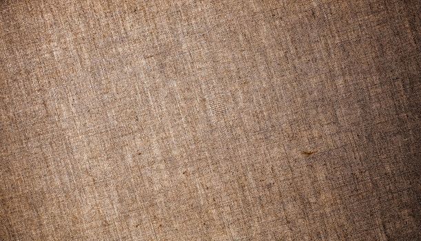 Textile material, natural surface and vintage decor texture concept - Decorative brown linen fabric textured background for interior, furniture design and art canvas backdrop