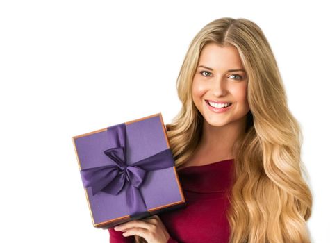 Holiday present, happy woman holding a gift or luxury beauty box subscription delivery isolated on white background, portrait