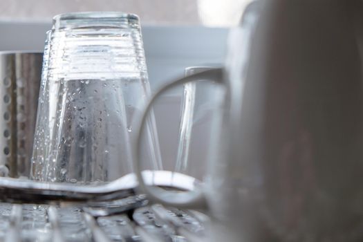 close up image of washing dishes