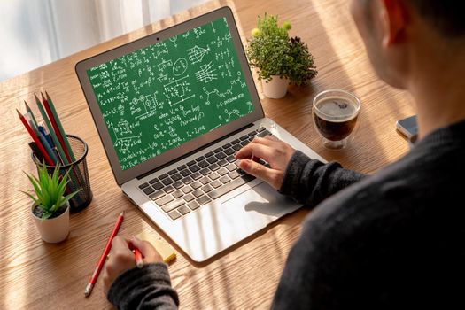 Mathematic equations and modish formula on computer screen showing concept of science and education