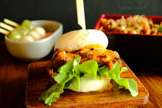 Hirata buns.  Japanese steamed buns filled with pork chashu, tempura, karaage. Japanese traditional food