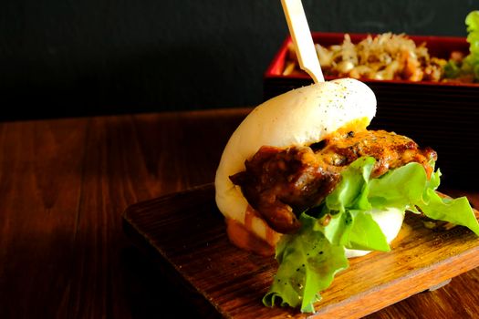 Hirata buns.  Japanese steamed buns filled with pork chashu, tempura, karaage. Japanese traditional food